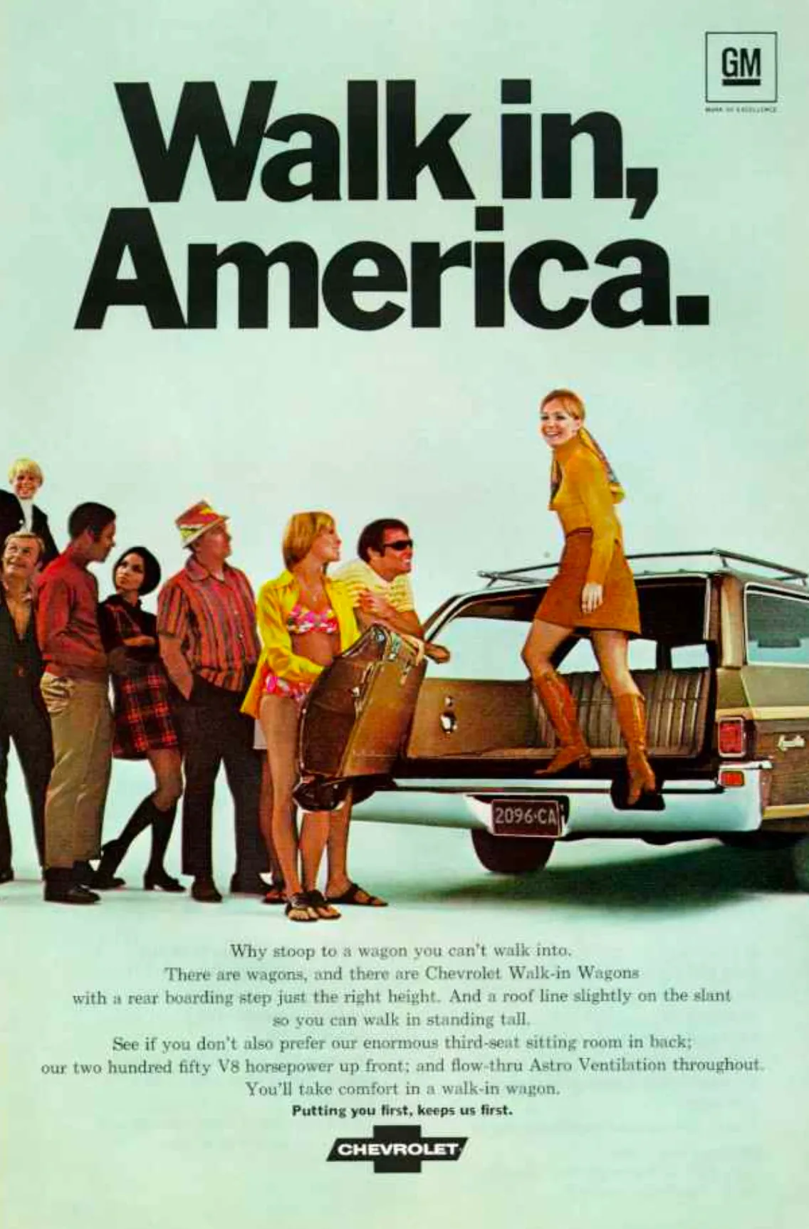 A woman steps into the open rear of a Chevrolet station wagon while a group watches beneath the large Walk in, America headline.