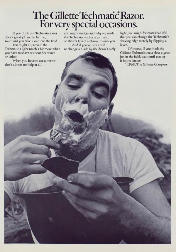 A man shaves outdoors with a Gillette Techmatic, holding a small mirror above a helmet, beneath three columns of copy.