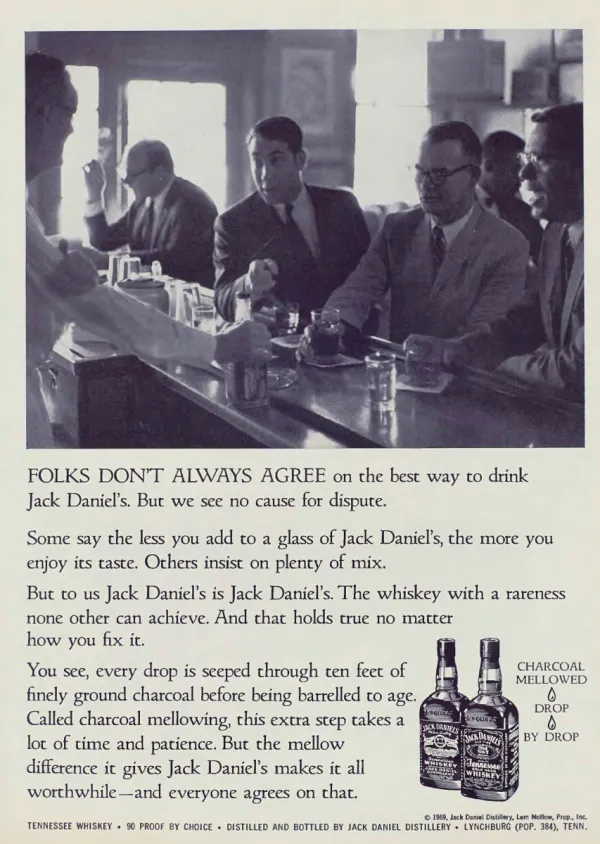 Black-and-white photograph of men at a bar above copy about drinking Jack Daniel's, with two whiskey bottles at lower right.
