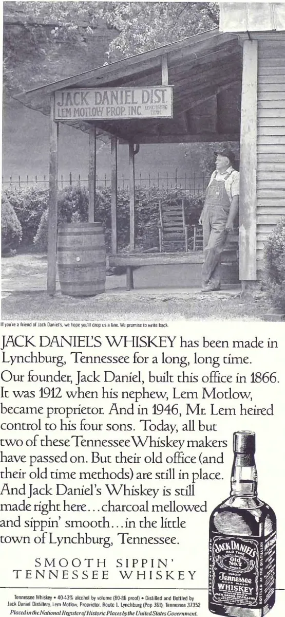 Black-and-white photograph of the old Jack Daniel Distillery office and a man standing on its porch, above a bottle and a heritage narrative.