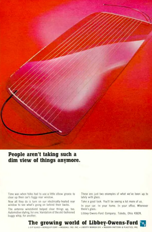 A glowing red car window with fine heating lines and an antenna fills most of the advertisement.