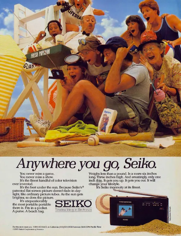 A crowd of surprised beachgoers gathers around a handheld Seiko color television; below, a product photograph beside a baseball shows its compact size.