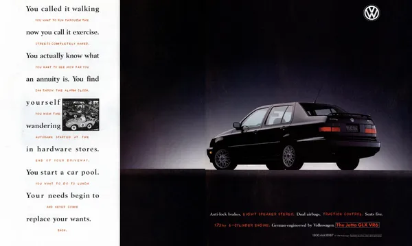 Two-page Volkswagen Jetta GLX VR6 ad pairing interwoven black and orange copy about adult responsibilities and driving desires with a dark rear three-quarter view of the sedan.